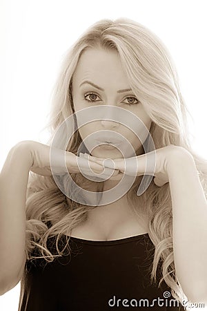 Toned Monochrome Sepia Portrait Of A Girl Resting Her Chin On He Stock Photo