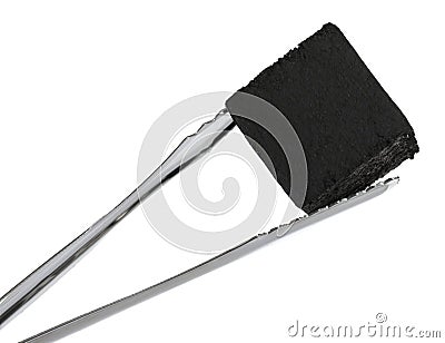 Tongs with charcoal cube for hookah on white background Stock Photo