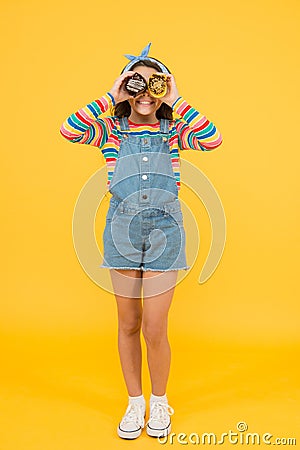 Too much calories. care about diet. choose birthday cupcake. small girl with homemade muffin. healthy food cooking Stock Photo