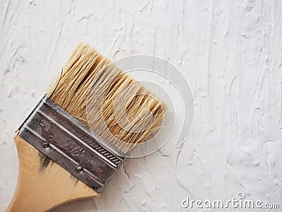 Tool for painting work. Spatula and brushes. Set of items for repair. Top view of a builder with a brush and spatula for applying Stock Photo