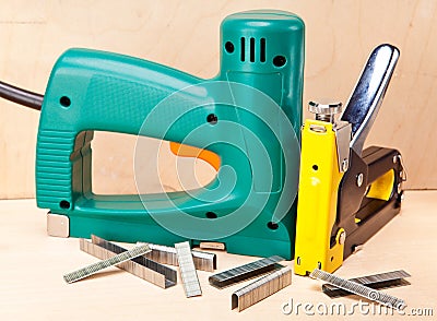 The tool - staplers electrical and manual mechanical .Close up Stock Photo