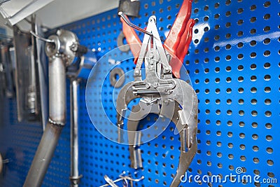 Tools of Car mechanic for a new piston for the engine, overhaul. Interior of a car repair shop. Stock Photo