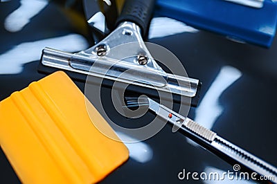 Tools for car tinting closeup, vehicle tuning Stock Photo