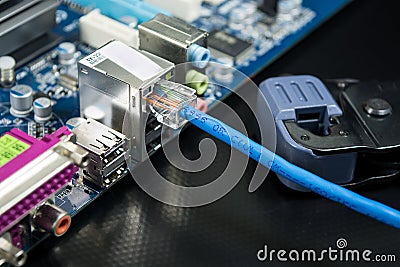 Tools for crimping network cable Tools for crimping network cable on printed circuit board. Stock Photo