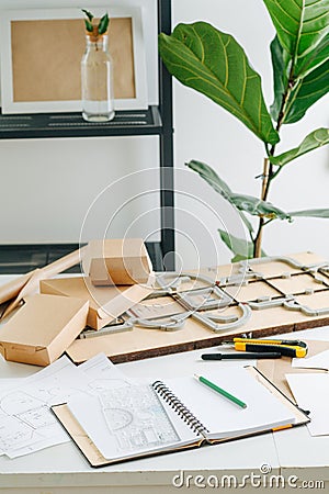 Tools for designing and making cardboard boxes in a private workshop Stock Photo