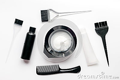 Tools for hair dye in barbershop on white background top view Stock Photo