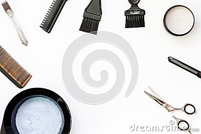 Tools for hair dye and hairdye top view white background Stock Photo