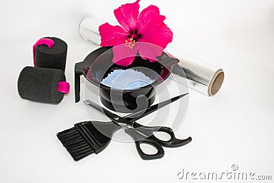Tools for hair dye and hairdye white background.Barber set with hair dye, foil and brush, scissors and curlers. Set for coloring. Stock Photo