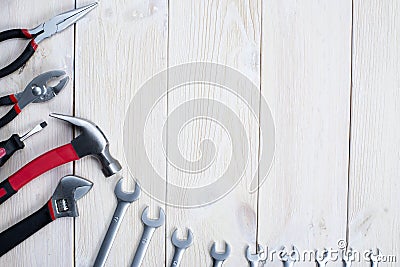 Tools for repair on white wooden background. Space for the test Stock Photo