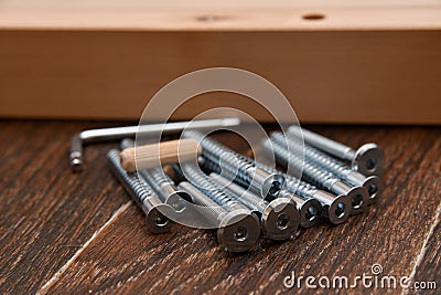 Tools, screws and wooden parts for self-assembly of furniture Stock Photo
