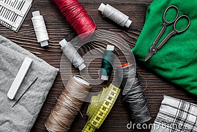 Tools for sewing for hobby set on wooden background top view pattern Stock Photo