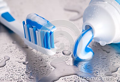 Tooth brush and paste Stock Photo