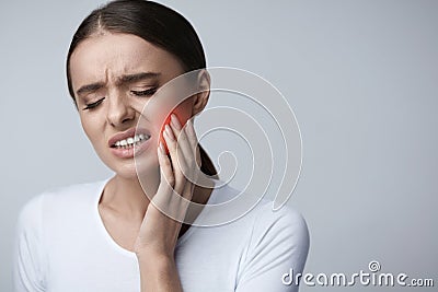 Tooth Pain. Beautiful Woman Feeling Strong Pain, Toothache Stock Photo