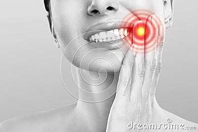 Tooth Pain And Dentistry. Young Woman Suffering From Strong Teeth Pain, Touching Cheek With Hand. Female Feeling Painful Stock Photo