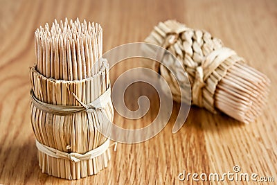 Tooth-picks on wooden table Stock Photo