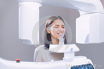 Tooth x-ray in the dental office. Young girl at the dentist`s appointment Stock Photo