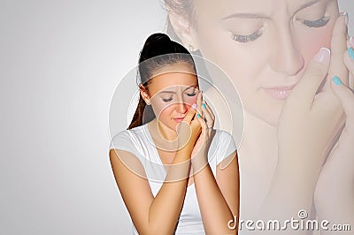 Toothache. Teeth problem. Woman feeling tooth pain. Closeup of beautiful sad girl suffering from strong tooth pain. Attractive fem Stock Photo