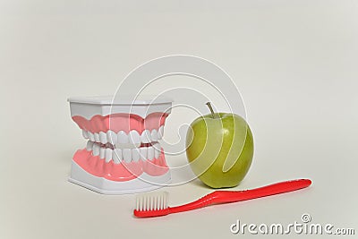 Toothbrush and green apple, dental care concept Stock Photo