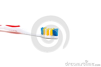 The toothbrush lies on a white background. Brushing your teeth to keep them healthy Stock Photo