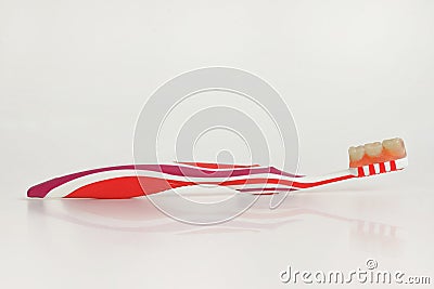 Toothbrush and teeth prosthesis Stock Photo