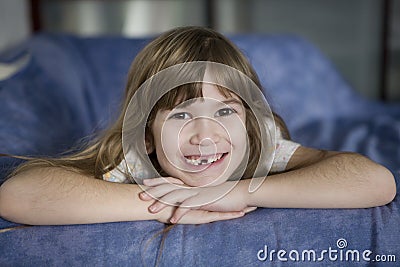 toothless cute smiling seven year girl Stock Photo