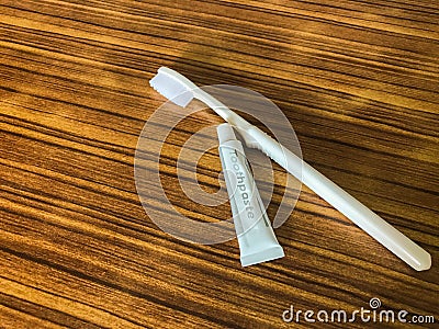 Toothpaste and tooth brush on table Stock Photo
