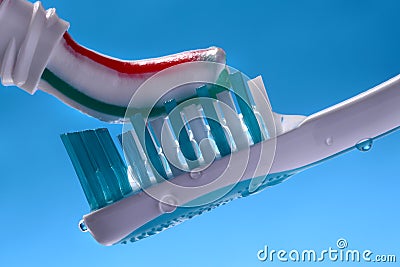 Toothpaste on toothbrush Stock Photo