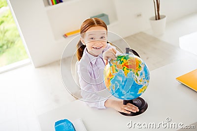 Top above high angle view photo of excited lovely cute charming kid search mainland answer question feel rejoice Stock Photo