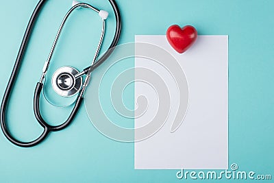 Top above overhead view photo of medical prescription paper with stethoscope beside and a heart isolated on turquoise background Stock Photo