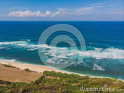 Top aerial view of beauty Bali beach. Empty paradise beach, blue sea waves in Bali island, Indonesia. Suluban and Nyang Stock Photo