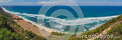 Top aerial view of beauty Bali beach. Empty paradise beach, blue sea waves in Bali island, Indonesia. Suluban and Nyang Nyang plac Stock Photo