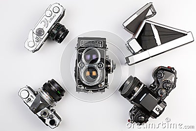 top analog cameras on white background, nikon, canon, olympus, p Editorial Stock Photo