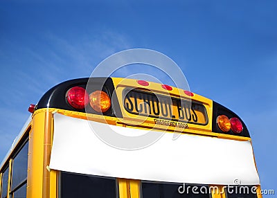 School Bus with White Banner - Blank to Add Text - Under Blue Sky Stock Photo