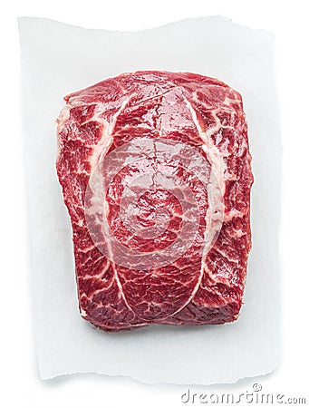 The top blade steak or beef steak over paper on white background Stock Photo