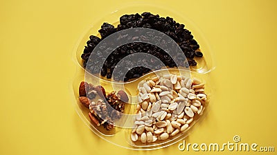 Top closeup view of delicious nuts in plastic transparent containers Stock Photo
