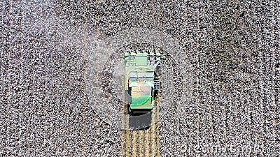 Aerial image of a Large Cotton picker harvesting a field. Editorial Stock Photo