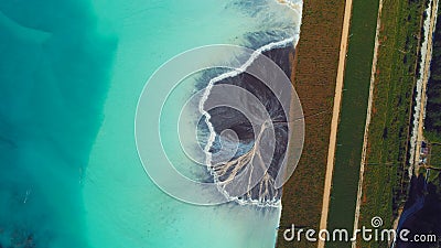 Top down aerial view over natural texture - abstract industrial lake water patterns. Turquoise waternature poluttion Stock Photo