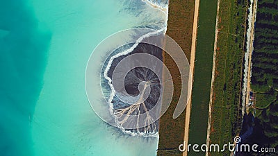 Top down aerial view over natural texture - abstract industrial lake water patterns. Turquoise waternature poluttion Stock Photo