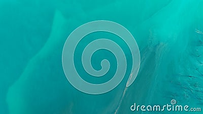 Top down aerial view over natural texture - abstract industrial lake water patterns. Turquoise waternature poluttion Stock Photo