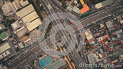 Top down of cross road traffic with cars, trucks, vehicles in aerial view. Downtown of Manila city Stock Photo