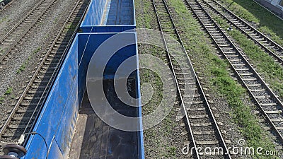 Top down view of a freight train. Cargo train on a station hub. Heavy industry. Industrial conceptual scene with train Stock Photo