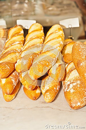 Rows freshly baked French baguettes Stock Photo