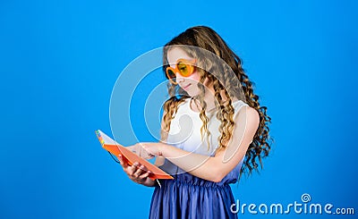 Top funny books to read. Beach reads for summer. Kid likes reading book. Popular vacation books. Great books for summer Stock Photo