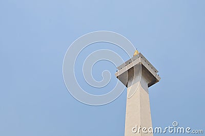 the top of the Jakarta National Monument, where you can see a large piece of gold Editorial Stock Photo