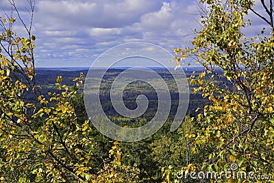 From the top of the megaliths of the Kamenny Gorod tract, a panorama of the Ural forests opens Stock Photo