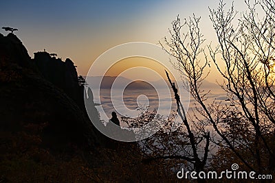 Top of a mountain above the clouds. Freedom before gravity Stock Photo