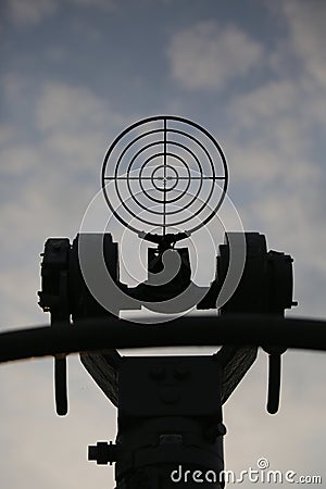 The top of the sighting column of the naval artillery system AK-630 against the background of the evening sky Stock Photo