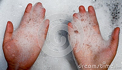 top up view bubble in hand on washing water Stock Photo