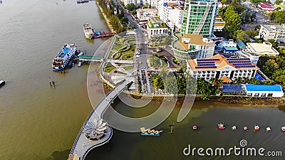 Top view aerial view love bridge or Ninh Kieu quay of downtown in Can Tho City, Vietnam with development buildings, transportation Stock Photo