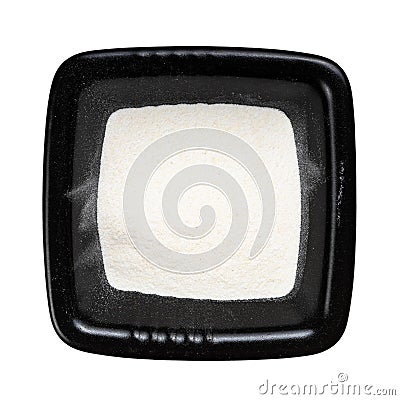 Top view of agar powder in black bowl isolated Stock Photo